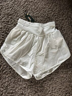 BMJL cream color running shorts size medium